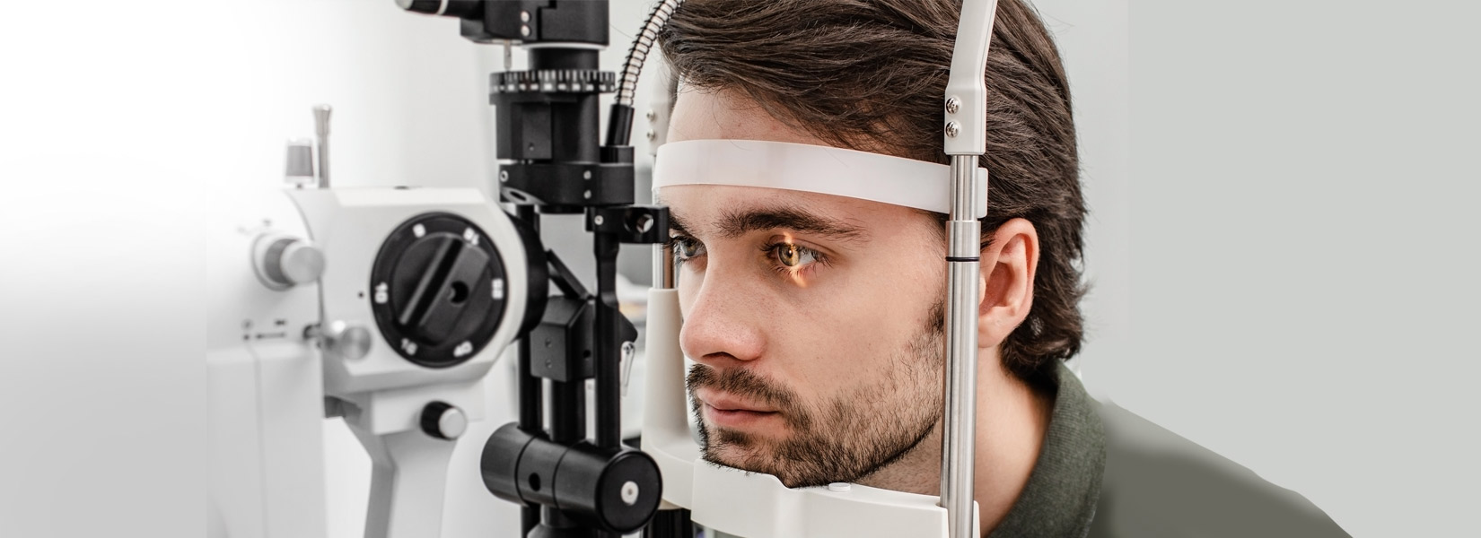 young man during eye exam in Bellevue